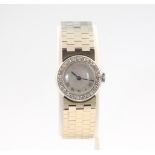 A lady's 9ct white gold cocktail watch with diamond set bezel, 36.8 grams gross
