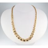 A 9ct yellow gold fancy link necklace of tapered style, 55.1 grams