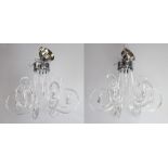 A pair of 6 light chrome and glass chandeliers 80cm h x 60cm diam.