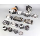 A Retinette 1A camera, a Pentax ME camera, a Halina 6-4 camera, Zenith-E, a Finetta camera, Canon