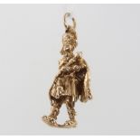 A 9ct yellow gold charm in the form of a soldier 5.7 grams