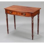 A Regency mahogany bow front side table fitted a frieze drawer raised on turned supports 77cm h x
