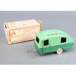 A Triang Minic caravan in green, boxed