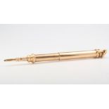 A 9ct yellow gold propelling pencil with hardstone end 17.4 grams gross, 10cm