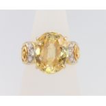 An 18ct yellow gold gem set dress ring size L, 10.3 gramsThis ring is not hallmarked but has been