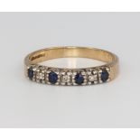 A 9ct yellow gold sapphire and diamond ring size R 1/2