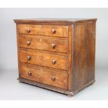 An 18th Century elm chest with hinged lid, fitted 4 drawers with tore handles, raised on square