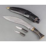 A Kukri with horn grip, 2 skinning knives and leather scabbard