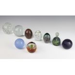 A Murano paperweight together with 8 others