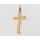 A 9ct yellow gold cross pendant 2.6 grams