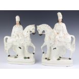 A pair of 19th Century Staffordshire flat back figures of "cavalrymen" 36cm 1 figure's head has been