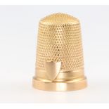 A 15ct yellow gold thimble 6.9 grams