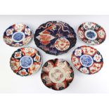 A Japanese Imari plate with panel decoration and scallop border, the base with seal mark 31cm and