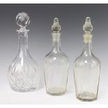 A cut glass mallet shaped decanter and stopper 29cm and 2 French pressed glass decanters and