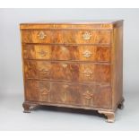Waring and Gillow, a Queen Anne style walnut chest of 2 short and 3 long drawers with brass swan