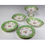 A Coalport 8 piece dessert service with twin handled comport, a boat shaped dish, square twin