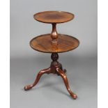 A 19th Century circular mahogany 2 tier dumb waiter, raised on pillar and tripod supports 80cm h,