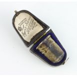 An Edwardian silver thimble in case Birmingham 1900