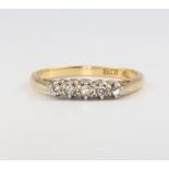 An 18ct yellow gold 5 stone diamond ring size P 1/2, 3.1 grams