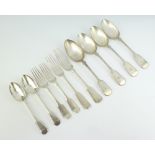 Four fiddle pattern silver plated table spoons, 2 ditto table forks, 2 pudding spoons and 2 table
