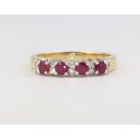 An 18ct yellow gold ruby and diamond ring 4.2 grams, size L 1/2