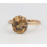 A 9ct yellow gold smoky quartz ring size I
