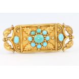 An Edwardian 15ct yellow gold turquoise set Etruscan style brooch 10.5 grams