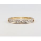 A 9ct yellow gold diamond ring size S 1/2, 3.1 grams