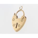 A 9ct yellow gold heart padlock, 1.9 grams