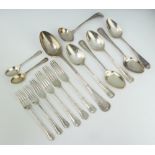 A 14 piece canteen of silver flatware comprising basting spoon, sauce ladle, 4 table spoons, 3 table