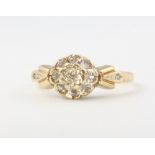 A 9ct yellow gold diamond cluster ring 2.6 grams, size O 1/2