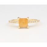 An 18ct yellow gold citrine and diamond ring, size O 1/2, 3.2 grams