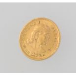 A 1966 half libra coin 1.6 grams