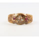 An 18ct yellow gold ruby and diamond ring 2.6 grams, size N