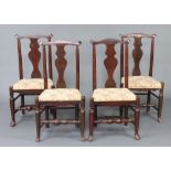 A set of 4 18th Century elm slat back dining chairs with upholstered seats raised on turned