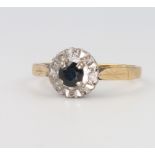 An 18ct yellow gold sapphire and diamond cluster ring, 2.6 grams