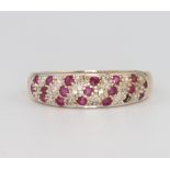 A 9ct yellow gold ruby and diamond ring 2.7 grams, size P