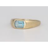 A 9ct yellow gold blue Topaz ring, size P 1/2, 2.3 grams