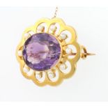 A 15ct yellow gold amethyst and pearl brooch 8.1 grams