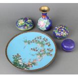 A blue ground cloisonne plate decorated a tree 25cm, 3 cloisonne blue ground and floral patterned