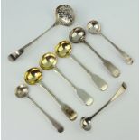 A Georgian silver sifter spoon and minor mustard spoons, mixed dates, 88 grams