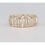 A 9ct yellow gold diamond set ring, 6.3 grams, size M