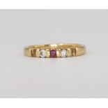 An 18ct yellow gold ruby and diamond ring 2.5 grams, size J (2 rubies are missing)