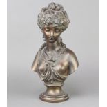 A spelter portrait bust of a girl raised on a socle base 31cm