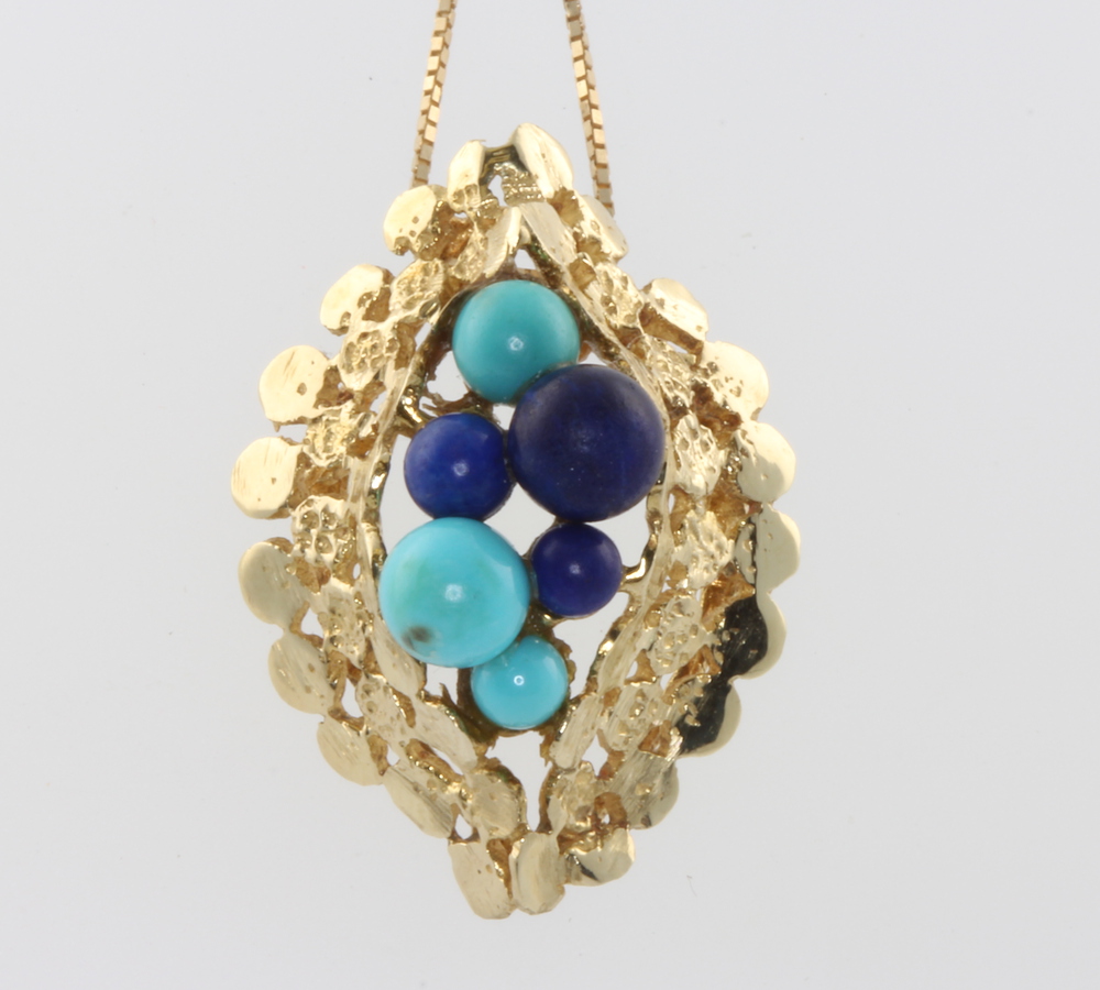 A 9ct yellow gold turquoise and lapis lazuli pendant and chain