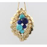 A 9ct yellow gold turquoise and lapis lazuli pendant and chain