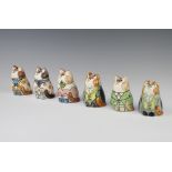 Six Rye Pottery figures of dressed cats with painted eyes 8cm