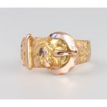 A 9ct yellow gold buckle ring, 4 grams, size N