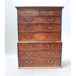 An 18th Century country oak chest on chest, the upper section with Grecian key patterned cornice