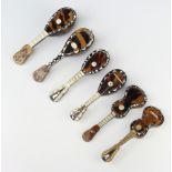 A collection of mother of pearl and bone miniature musical instruments - 2 guitars and 4